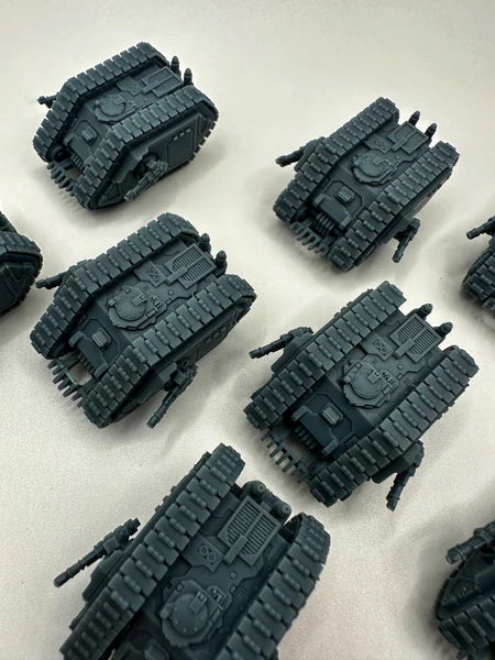 Multiple sci-fi armored tanks with dual tracks, turret guns and detailed hull plating — unpainted 3D-printed resin vehicles for tabletop wargaming and painting, Proxy Wargaming Australia.