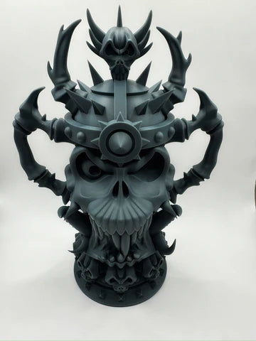 Highly detailed gothic skull throne sculpture with spiked crown, fanged jaw, and layered skeletal motifs, premium unpainted resin 3D print for collectors and display – Proxy Wargaming Australia.